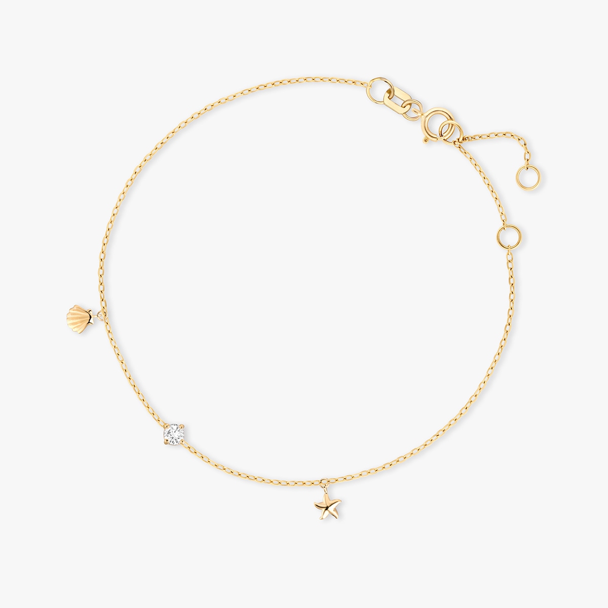 Bransoleta złota z rozgwiazdą i muszlą
