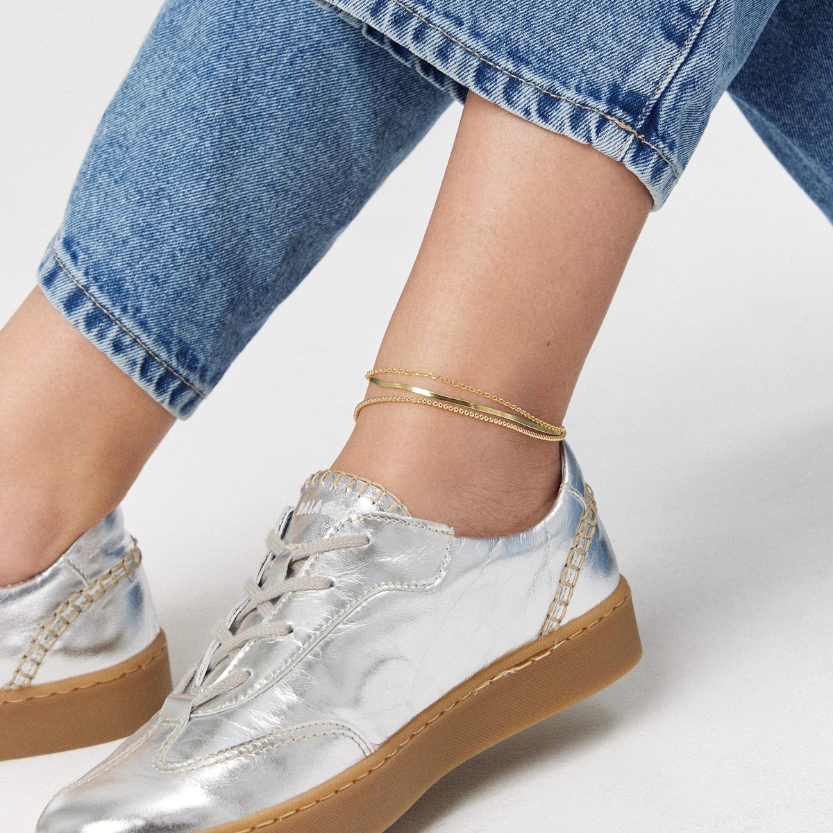 Bransoleta srebrna pozłacana na nogę