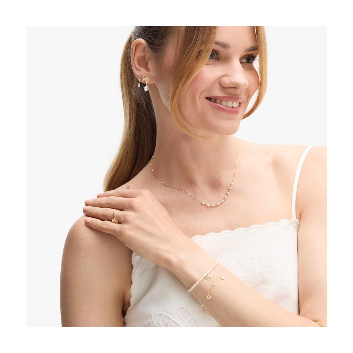 Kolczyki złote z muszlą i perłą Santorini