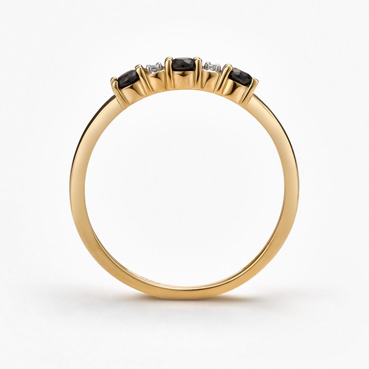 Pierścionek złoty z czarnymi szafirami