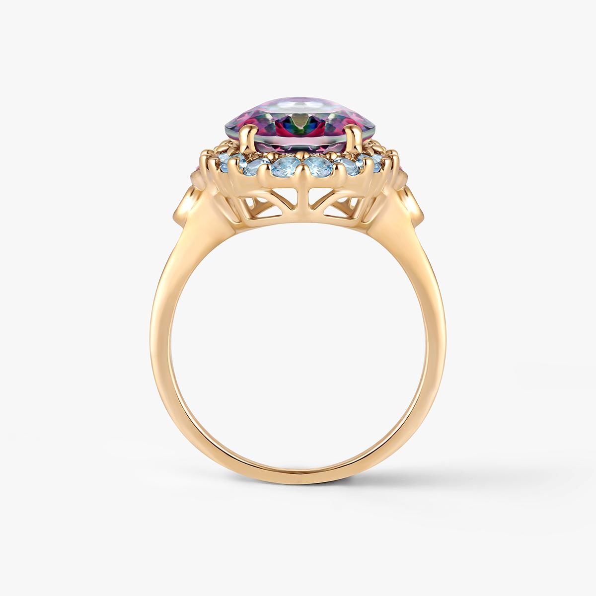 Pierścionek złoty z topazami i rodolitami