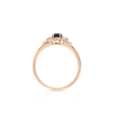 Pierścionek różowe złoto z czarnym szafirem i topazami