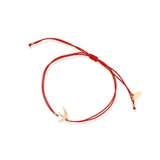Bransoletka srebrna pozłacana na czerwonym sznurku jaskółka