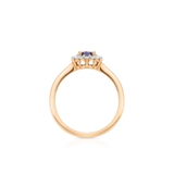 Pierścionek złoty z tanzanitem i białymi topazami