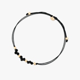 Bransoleta na czarnym sznurku