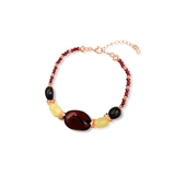 Bransoleta srebrna pozłacana z bursztynami i granatami