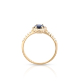 Pierścionek złoty z szafirem i białym topazem