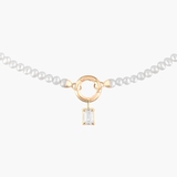 Wisiorek złoty z białym topazem