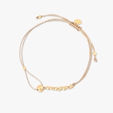 Bransoletka na beżowym sznurku