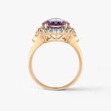 Pierścionek złoty z topazami i rodolitami