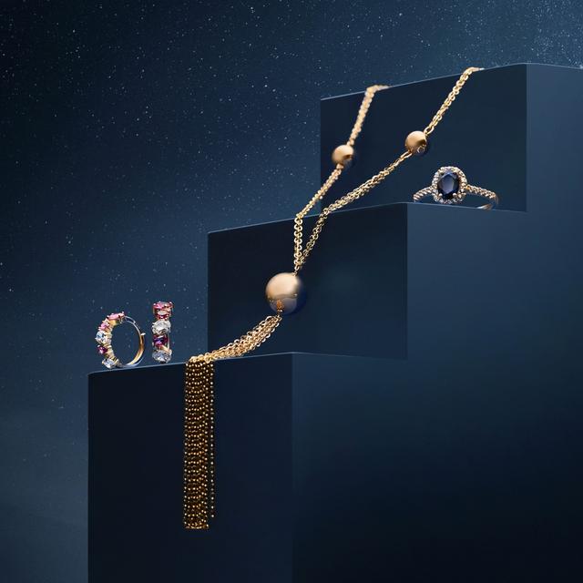 Pierścionek złoty z szafirem i białym topazem