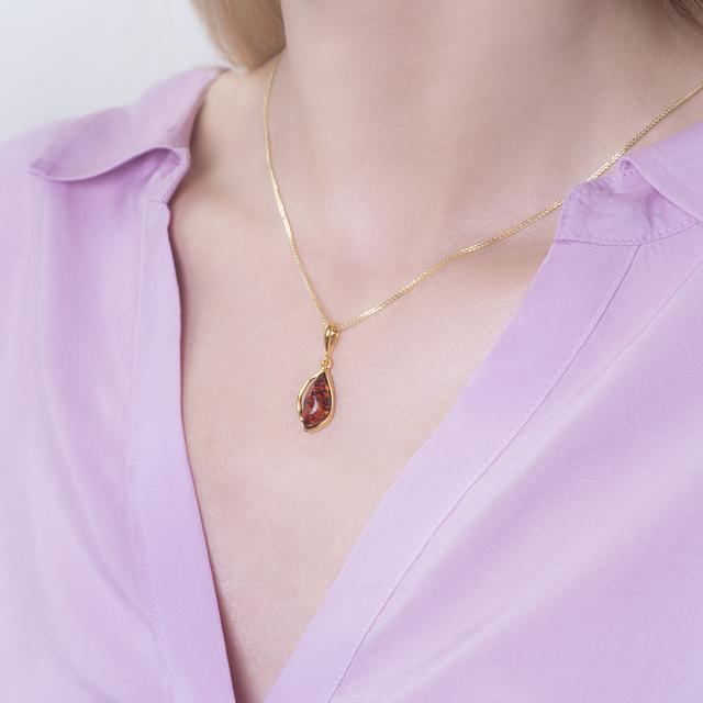 Wisiorek srebrny pozłacany z bursztynem