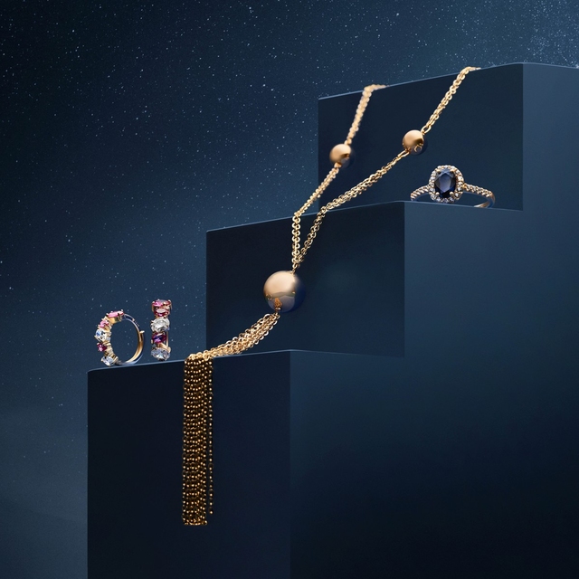 Pierścionek złoty z szafirem i białym topazem