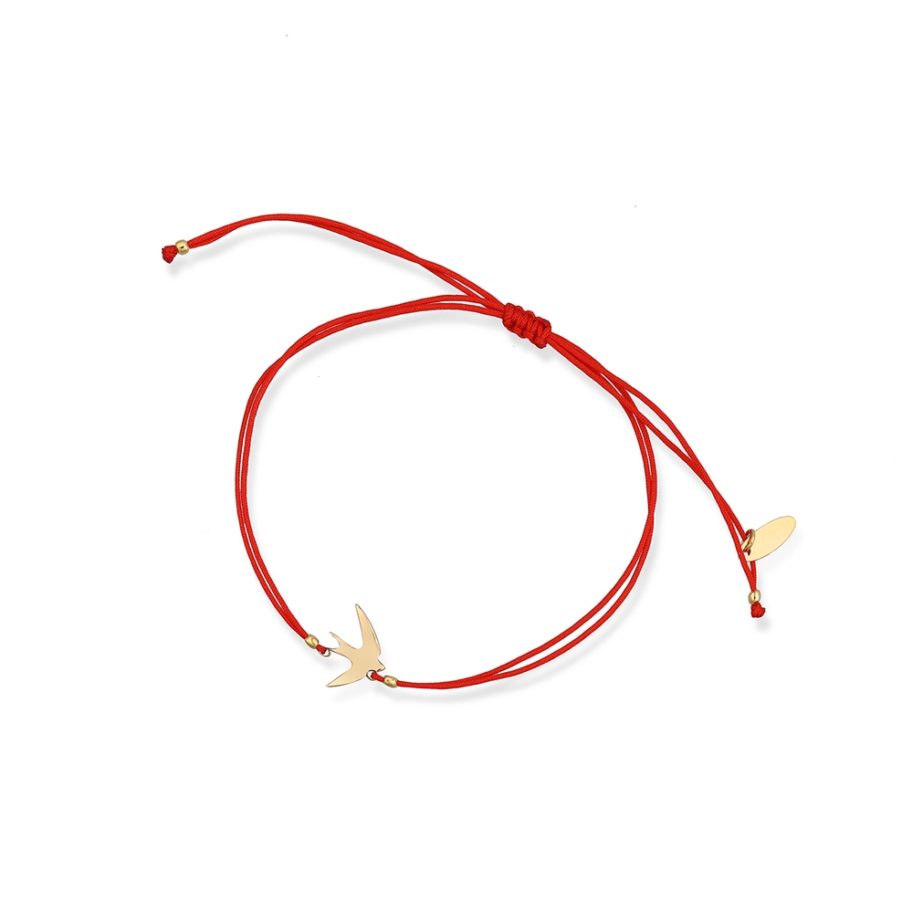 Bransoletka srebrna pozłacana na czerwonym sznurku jaskółka