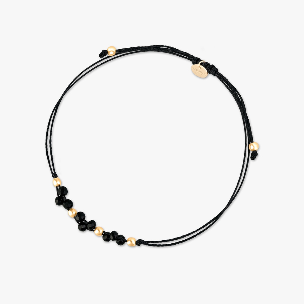 Bransoleta na czarnym sznurku