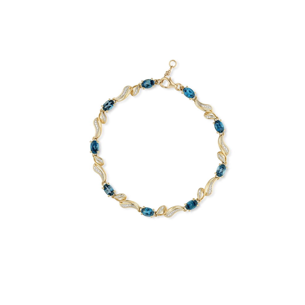 Bransoleta złota z diamentami i topazami