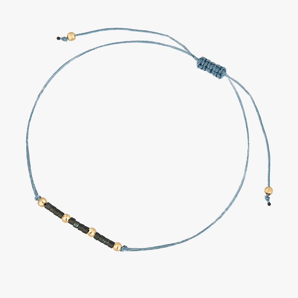 Bransoleta sznurkowa z niebieskimi koralikami