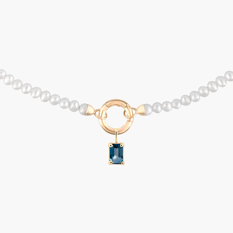 Wisiorek złoty z topazem london blue